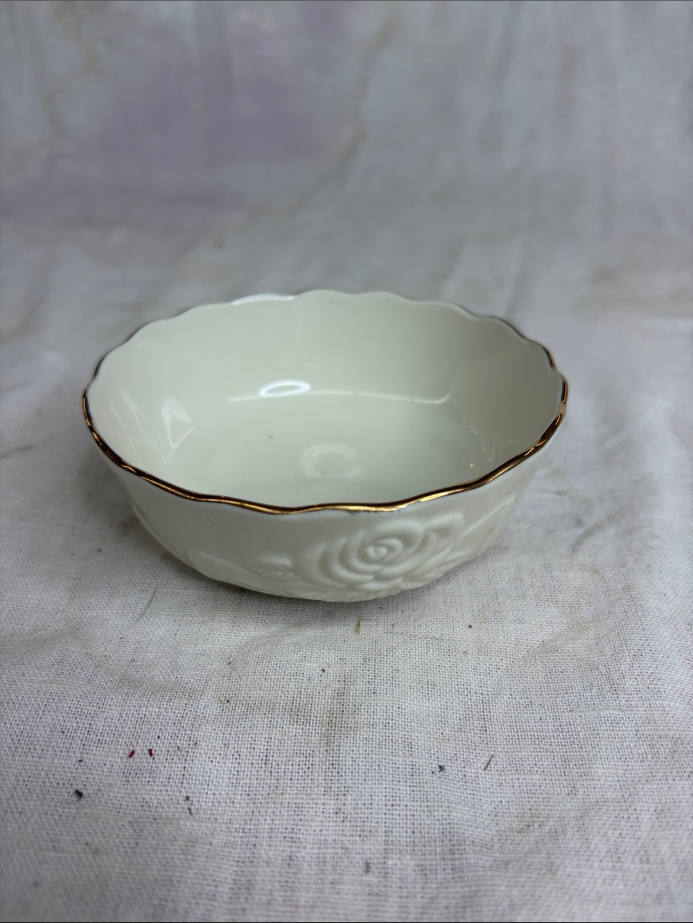 Scalloped White Ceramic Bowl with Gold Trim